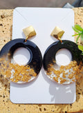 Boucles d'oreilles artisanales rondes noires et dorées