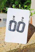 Boucles d'oreilles artisanales grises et strass